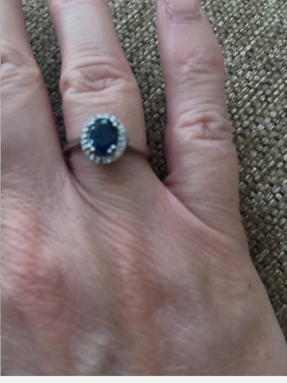 Elegant Sapphire Oval Halo Ring with Diamond Accent in Sterling Silver - Picture 2 of 3